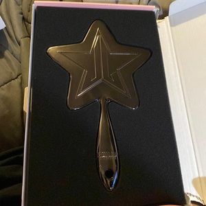 Chrome Jeffrey Star hand mirror. Used. In box.
